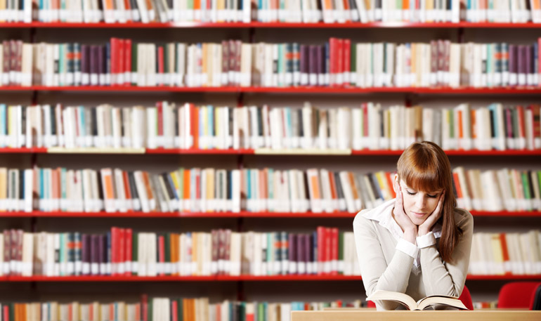 student in a library