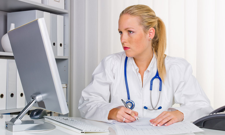 health care professional with stethoscope